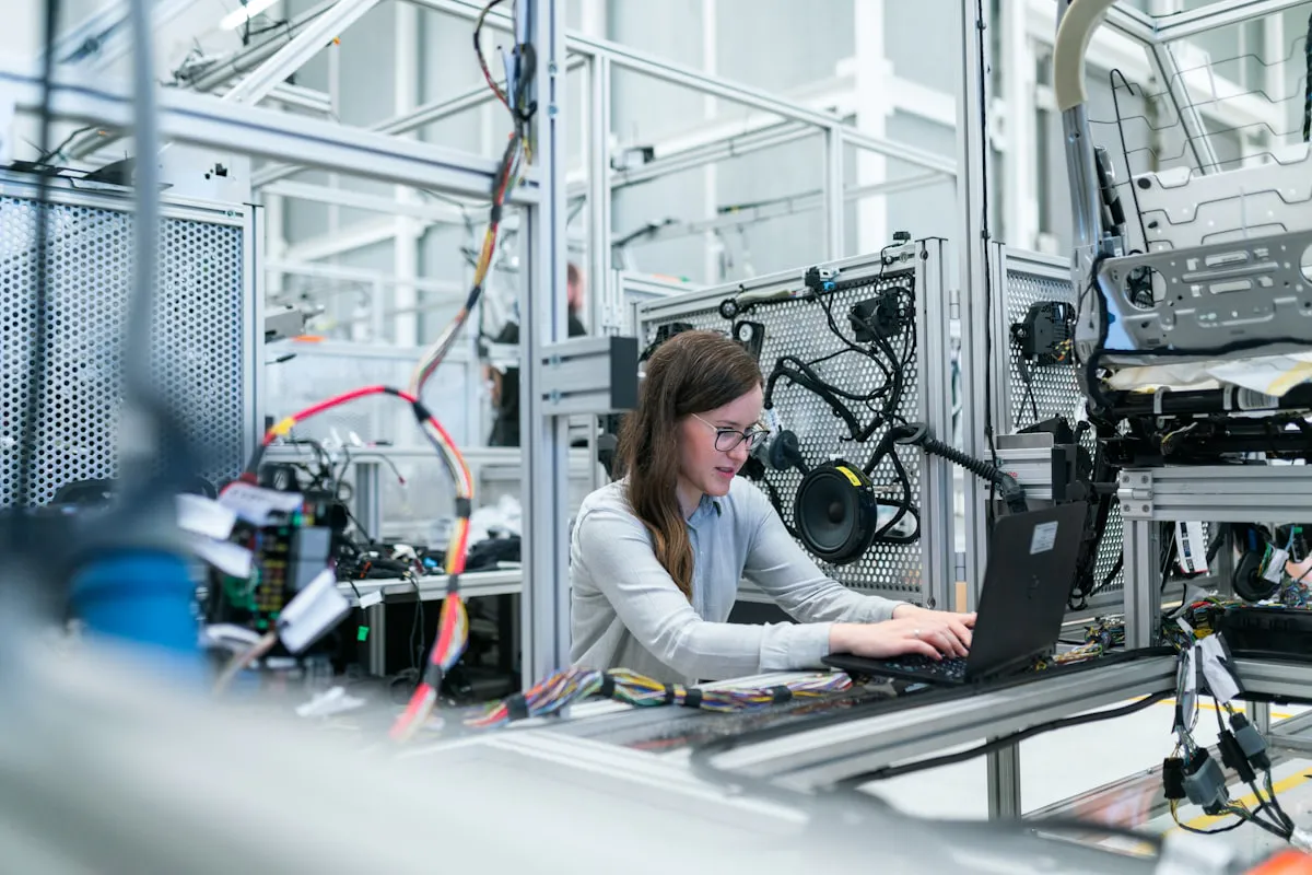 UKG Ready vs Paycor: 6 Reasons Mid-Market Wins with UKG 2 UKG Ready vs Paycor Manufacturing employee using UKG Ready workforce management — a key advantage over Paycor for complex shifts